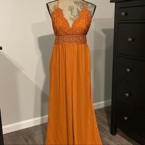 Blashe rust/pumpkin Long jumpsuit with lace top front and open back size Large